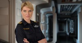Warrant officer standing in corridor